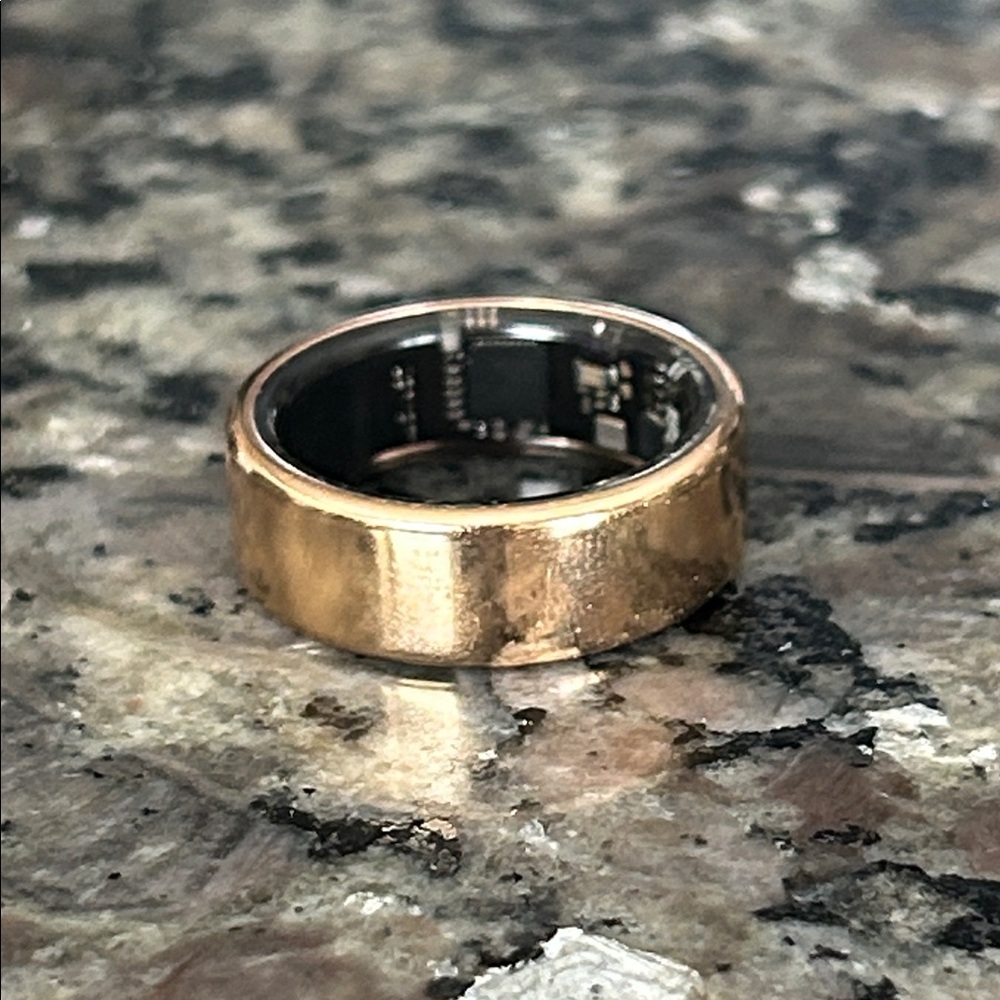 Gold women’s ring. Knock off Oura Ring
